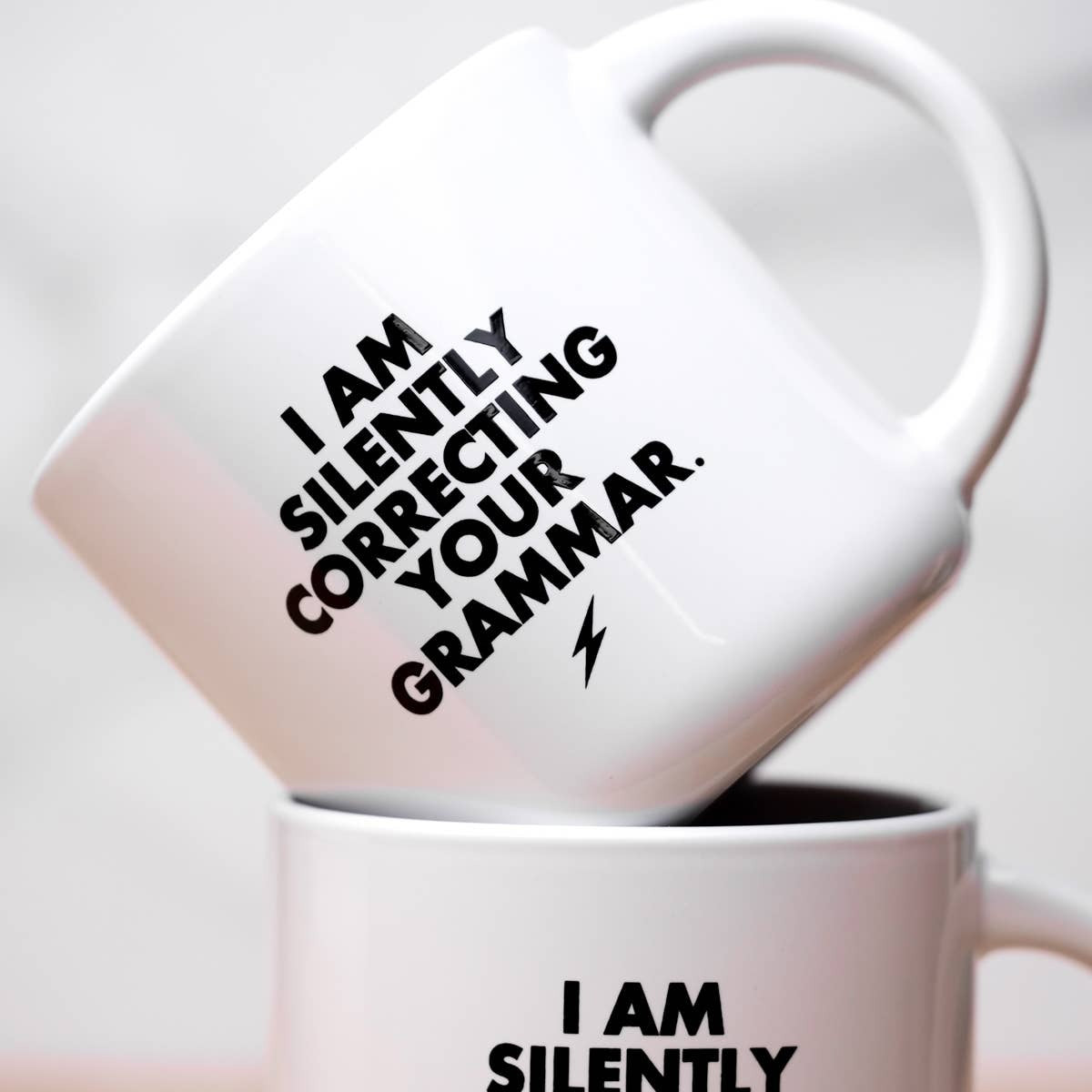 SILENTLY CORRECTING MUG