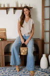 SLEEVELESS KNIT SWEATER