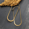 COSMIC OVAL GOLD EARRING