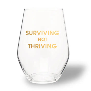 SURVIVING NOT THRIVING WINE GLASS