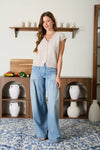 SLEEVELESS KNIT SWEATER
