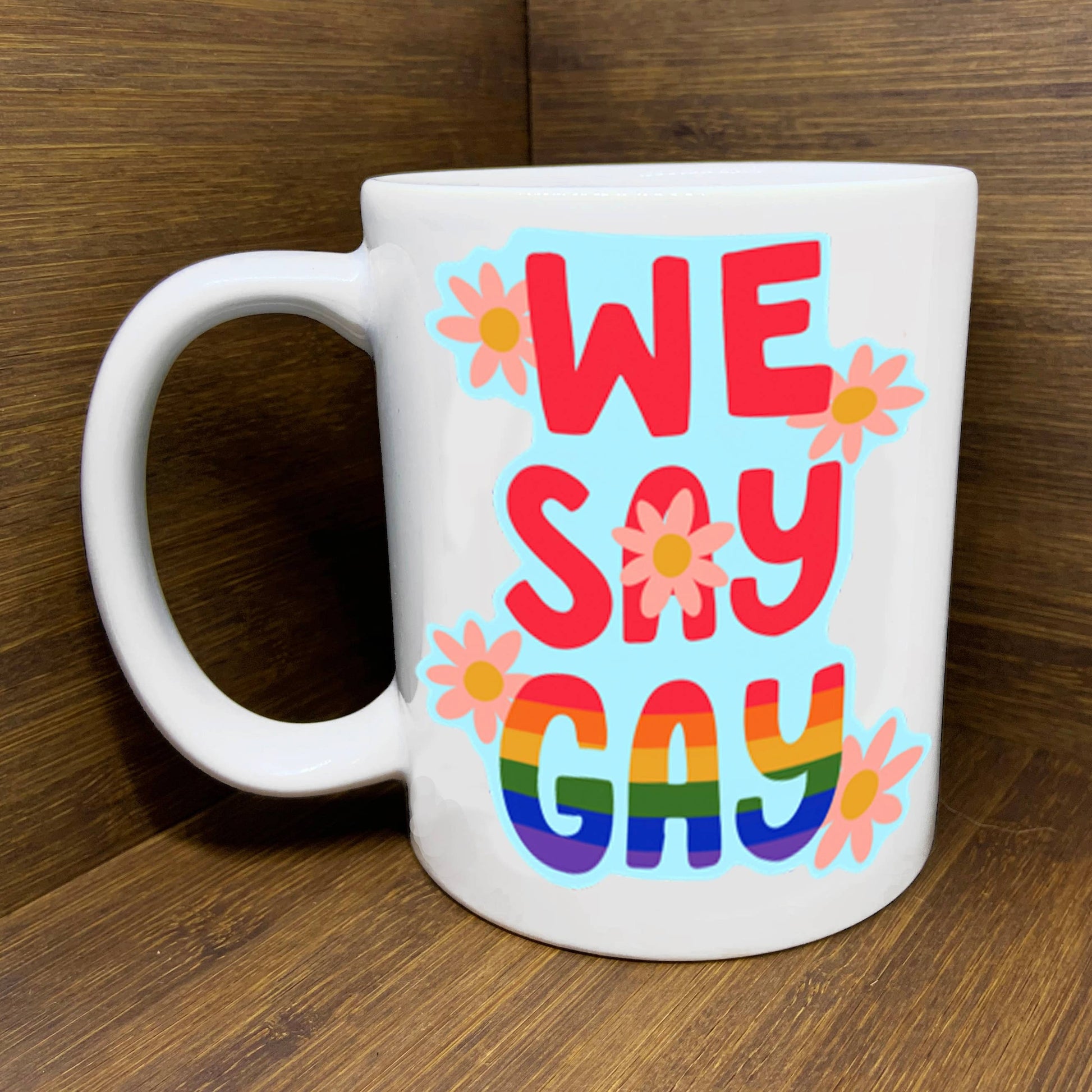 WE SAY GAY MUG
